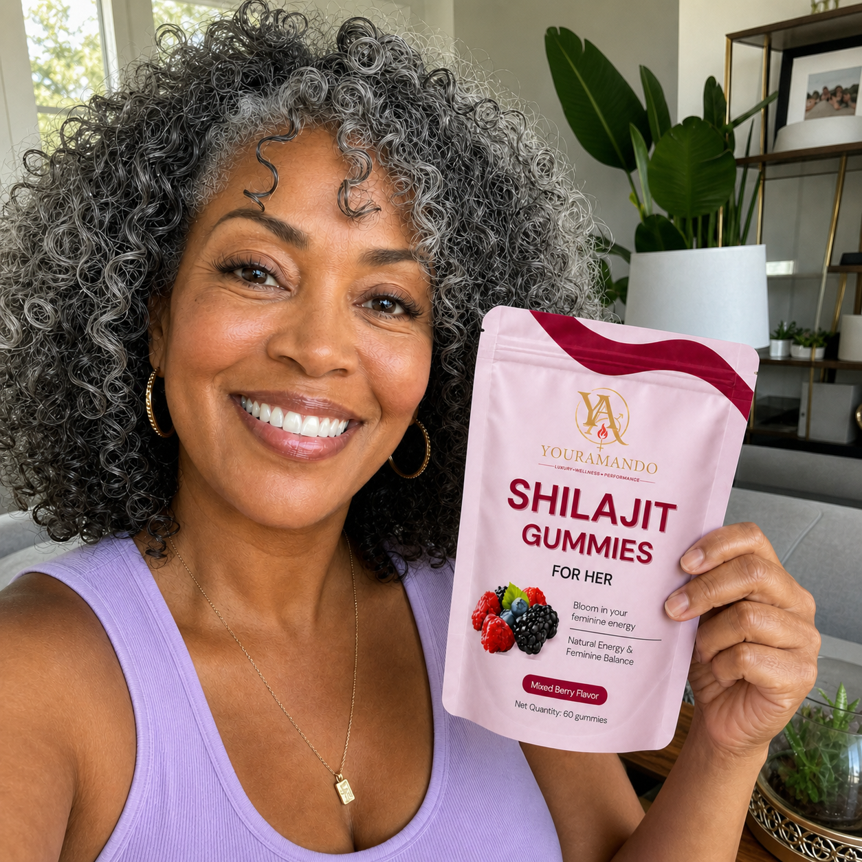 Customer holding a pouch of Shilajit Gummies for Her