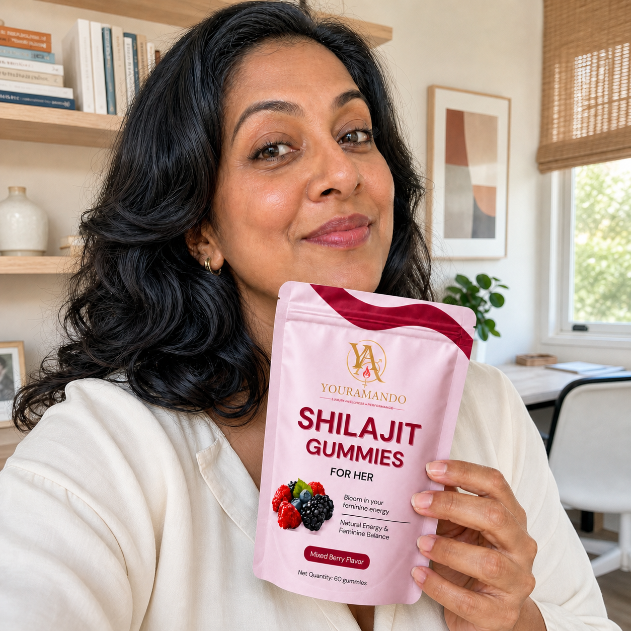 Customer holding a pouch of Shilajit Gummies for Her